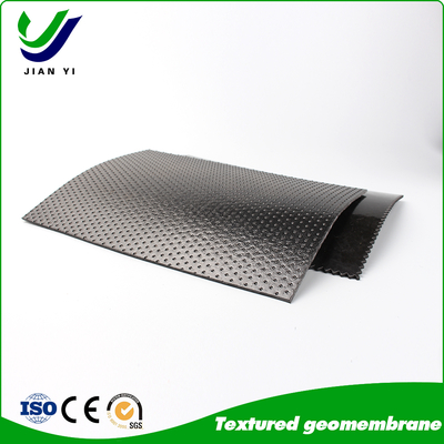 品質  Textured Geomembrane: Where Grip Meets Impermeability on the Steepest Slopes；Sub-headline: Defy Gravity. Lock Barriers in Place. Engineer Absolute Stability. 工場