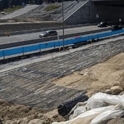 高張力と小長さ 道路床の強化のためのガラス繊維のジオグリッド ダム斜面保護と砂制御プロジェクト